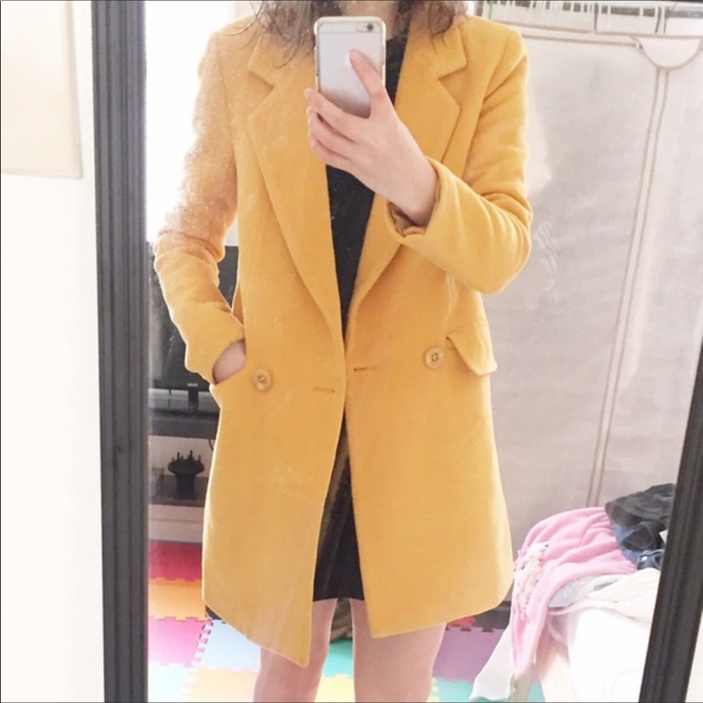 Yellow winter coat. 85% new